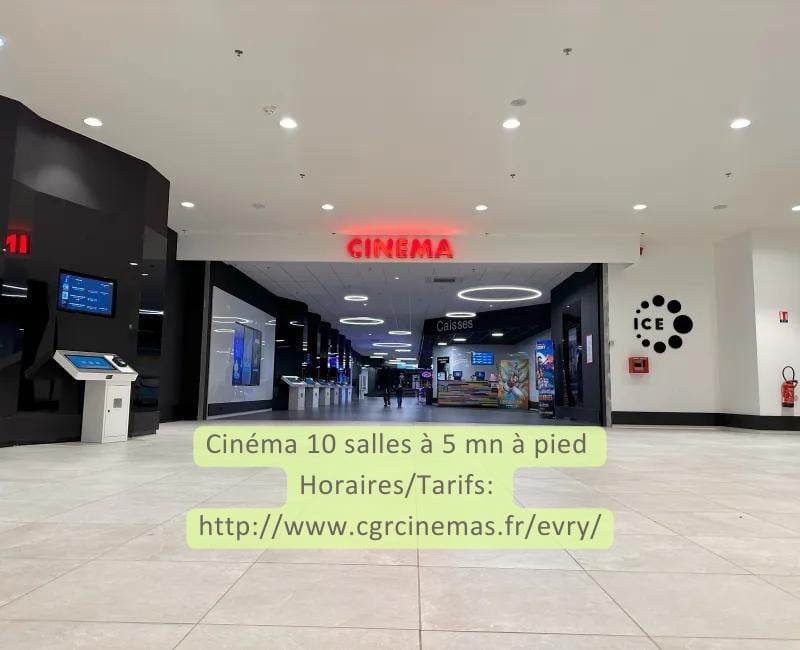 Bâtiment — Cinema entrance hall with red neon sign