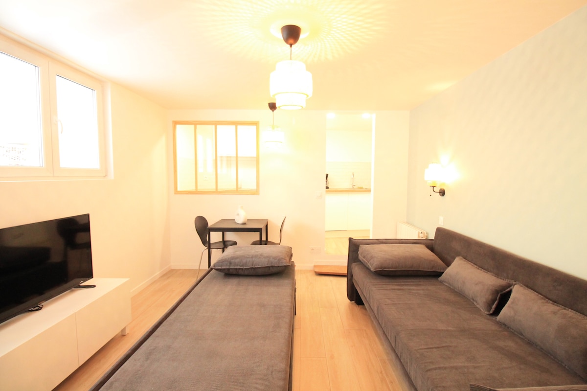 Chambres — Chambre avec deux lits et salon intégré